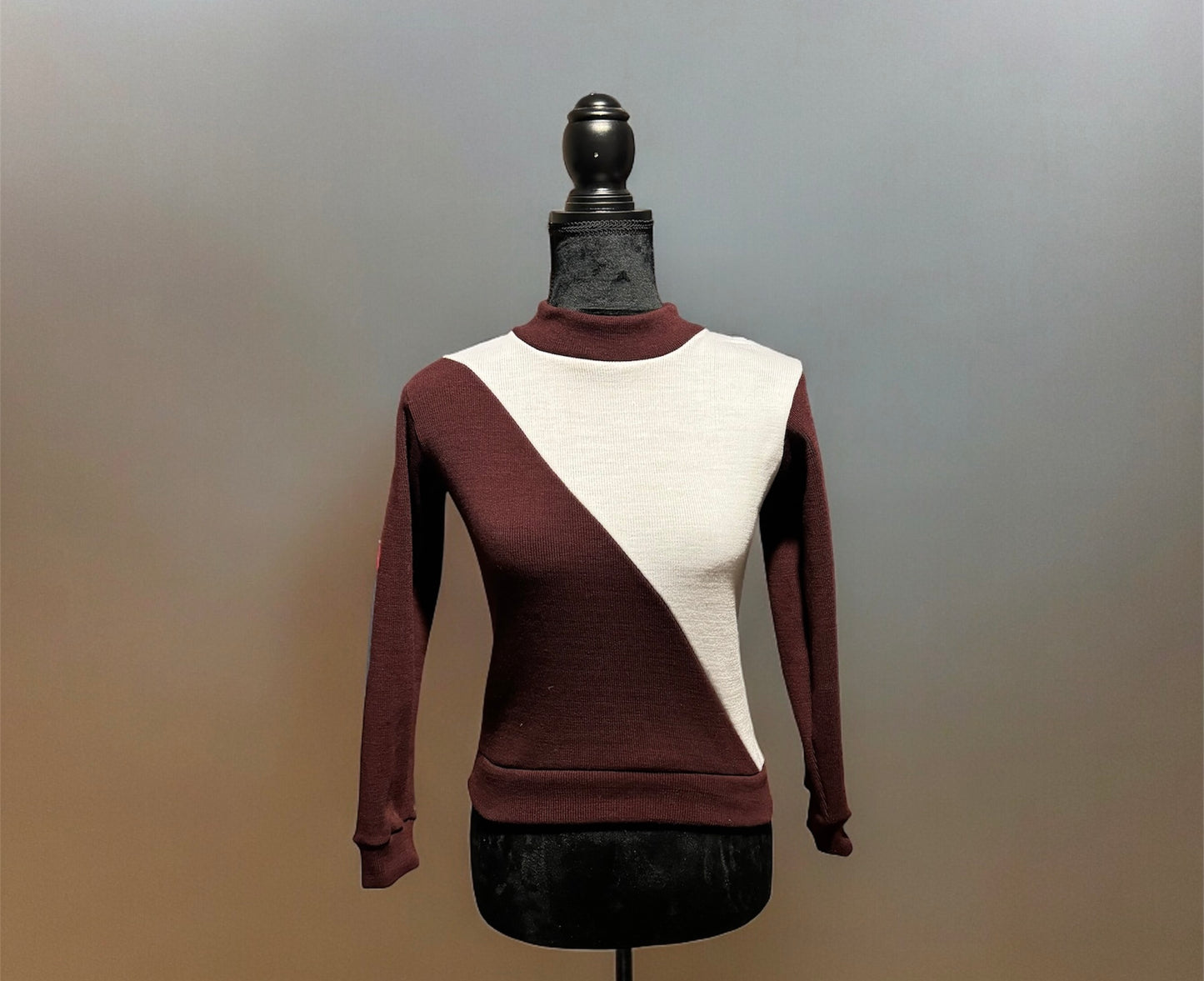 Suéter combinado dos colores